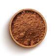 Cacao. Pile of cocoa powder in wooden bowl isolated on white background, top view